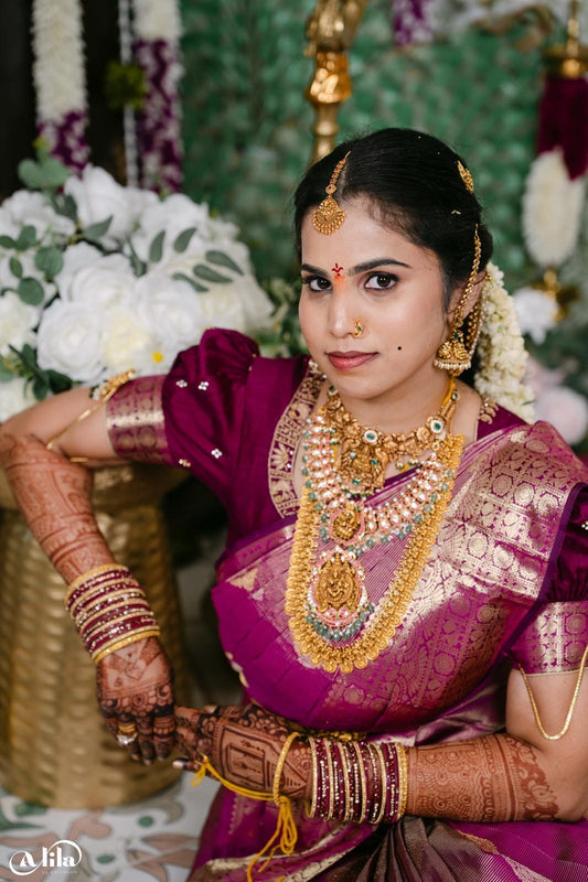 Traditional bride wearing Manuu Mehendi bridal henna