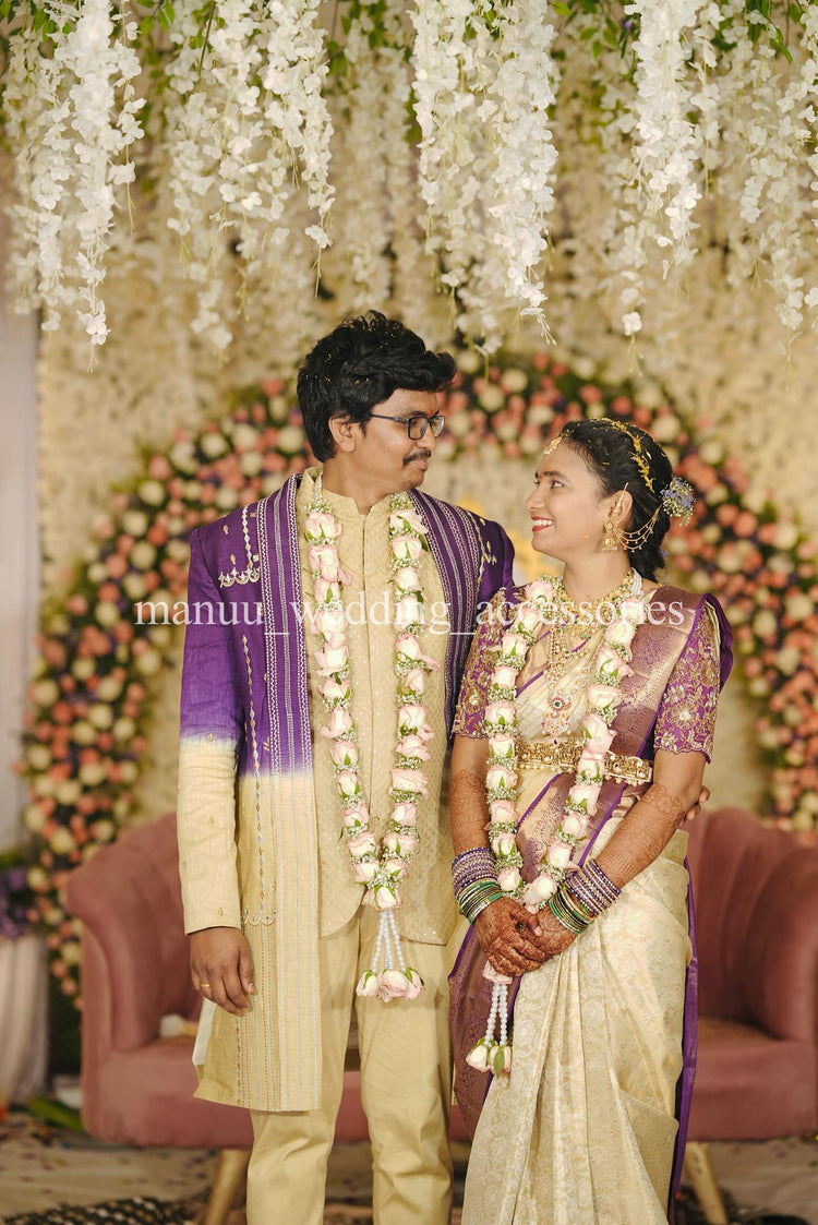 White and pink roses with baby's breath garland